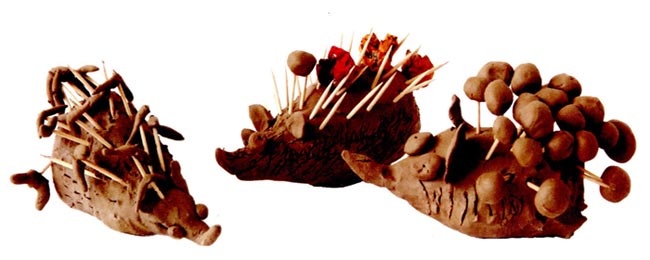 幼兒園中班美術(shù)教案陶藝活動(dòng):小刺猬摘果子
